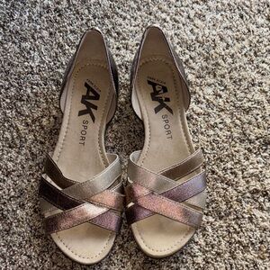 Anne Klein Black and Brown Flats with Elegant Design